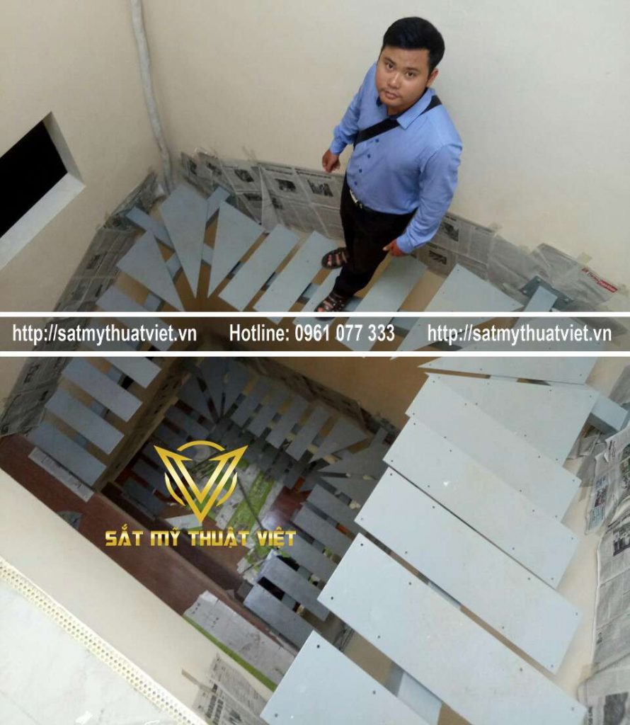 Lắp đặt cầu thang xương sắt lan can kính tại Hà Nội